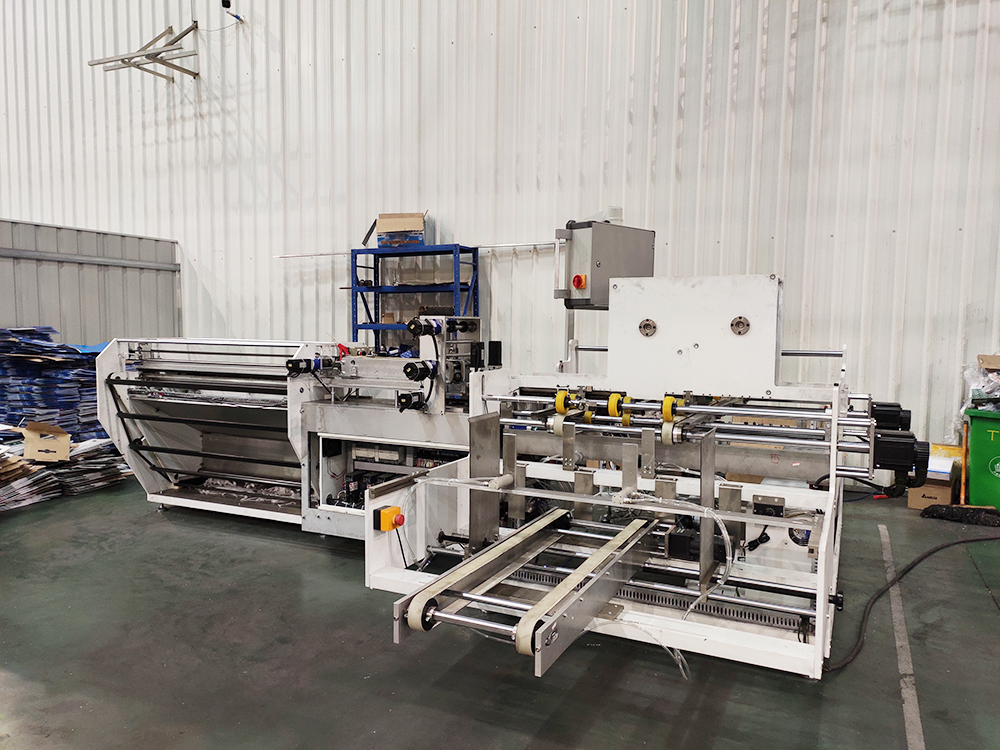 自動(dòng)片提扣機(jī)